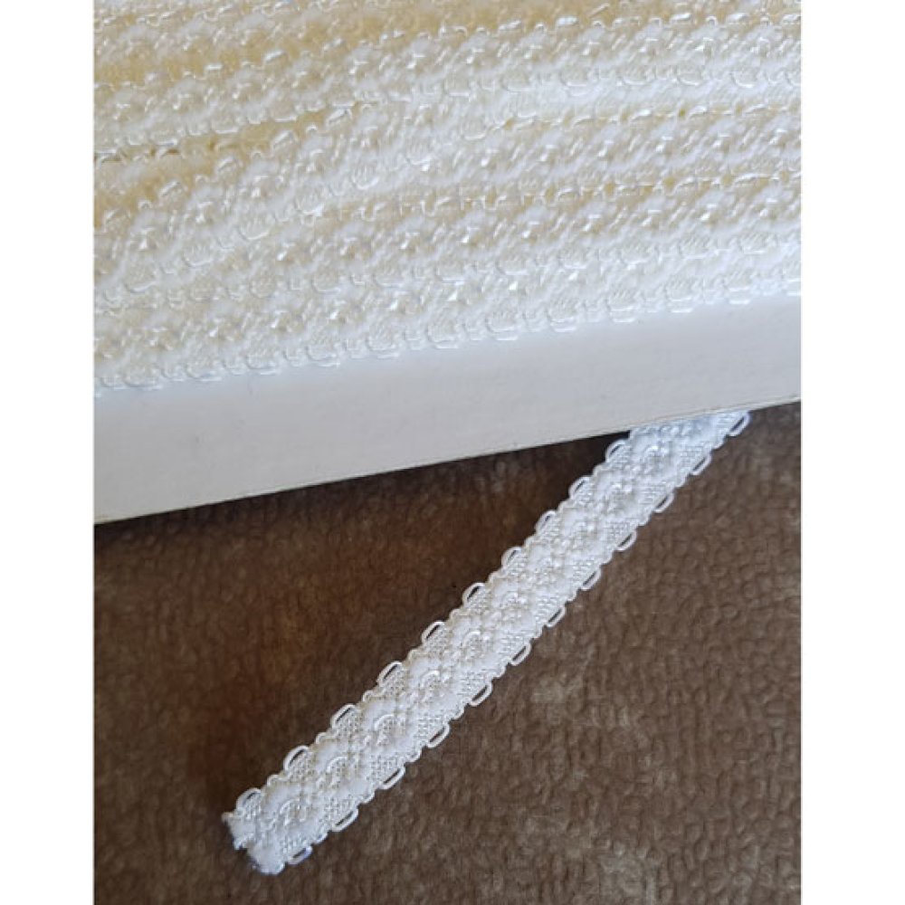 Al metro elastico Fancy bianco 11 mm.