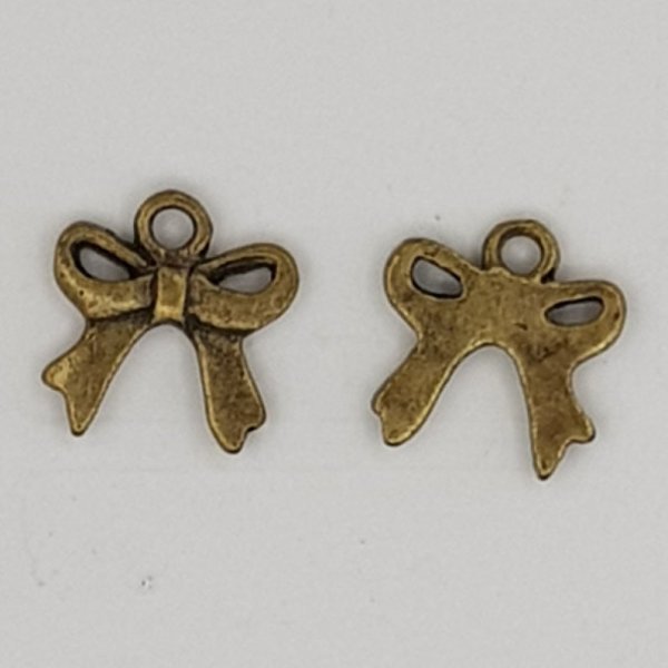 Charm Node N&deg;12 Fascino con nodo a nastro in metallo bronzo