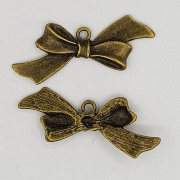 Charm a forma di papillon N&deg;18 Nastro in metallo bronzo