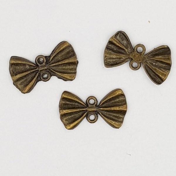 Charm a forma di papillon N&deg;22 Nastro in metallo bronzo