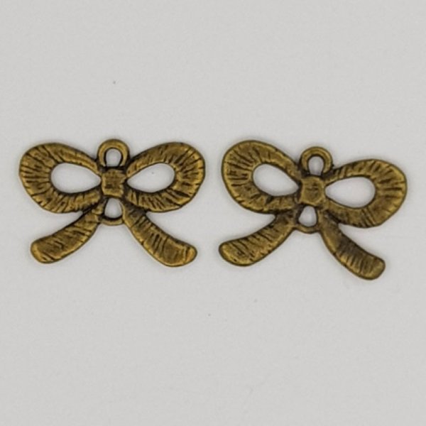 Charm a forma di papillon N&deg;23 Charm a nastro in metallo bronzo