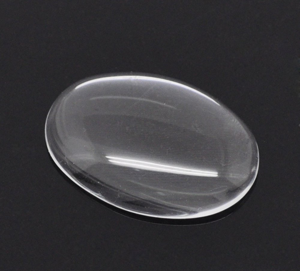 Cabochon ovale 18 x 25 mm in vetro trasparente con bava N°19