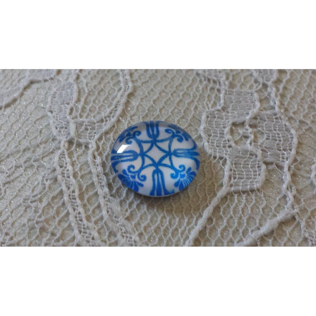 cabochon in vetro rotondo 12 mm fiore blu 035 