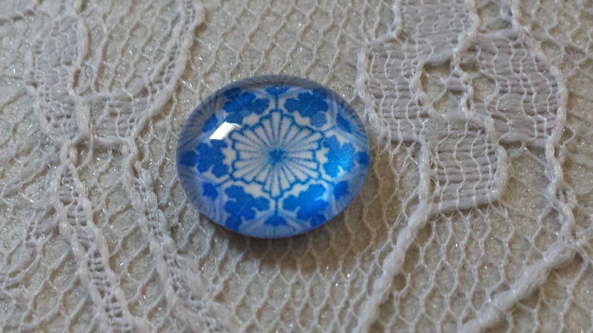 cabochon in vetro rotondo 12 mm fiore blu 031 