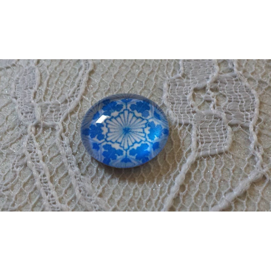 cabochon in vetro rotondo 12 mm fiore blu 031 