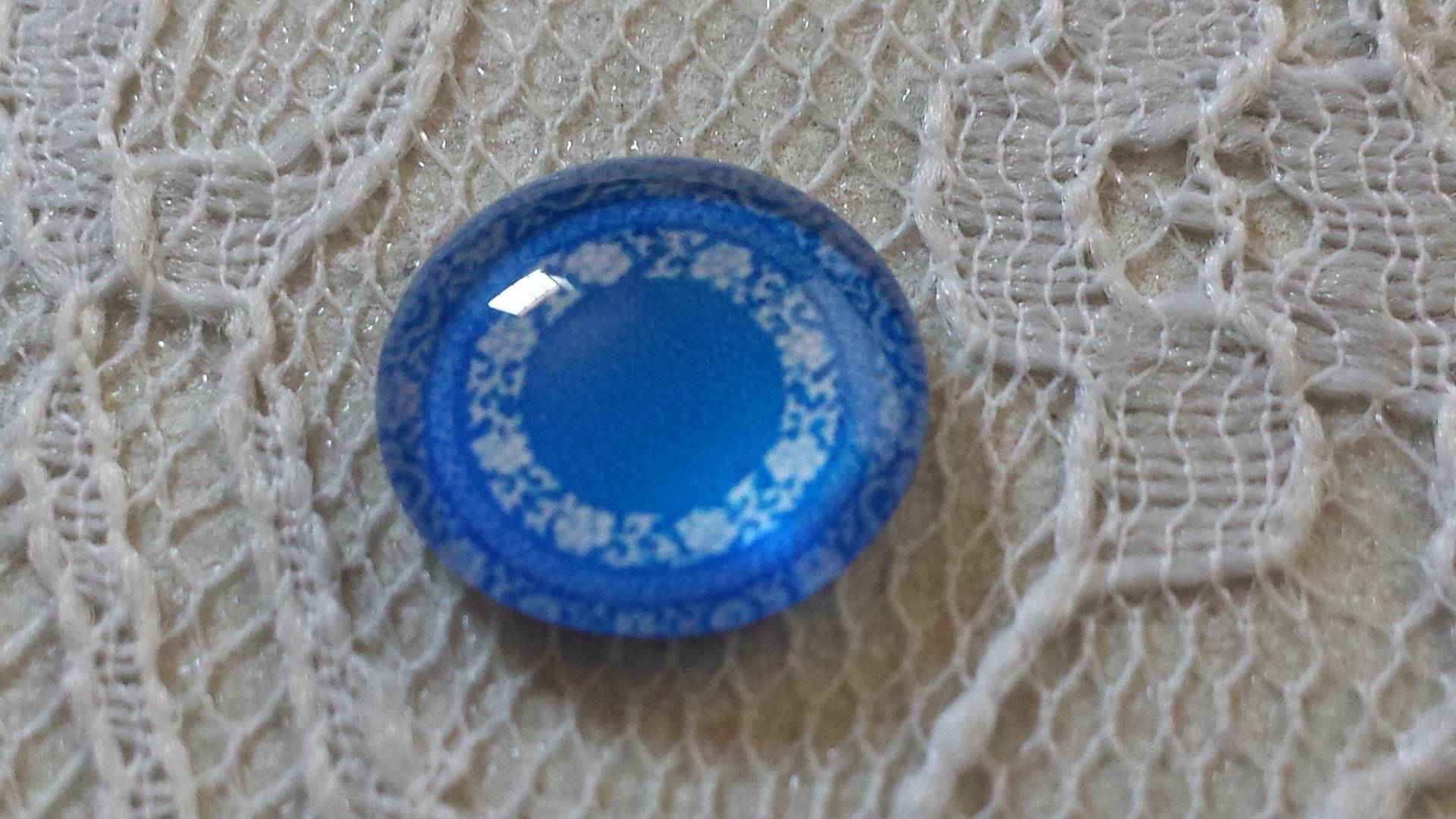 cabochon in vetro rotondo 12 mm fiore blu 027 