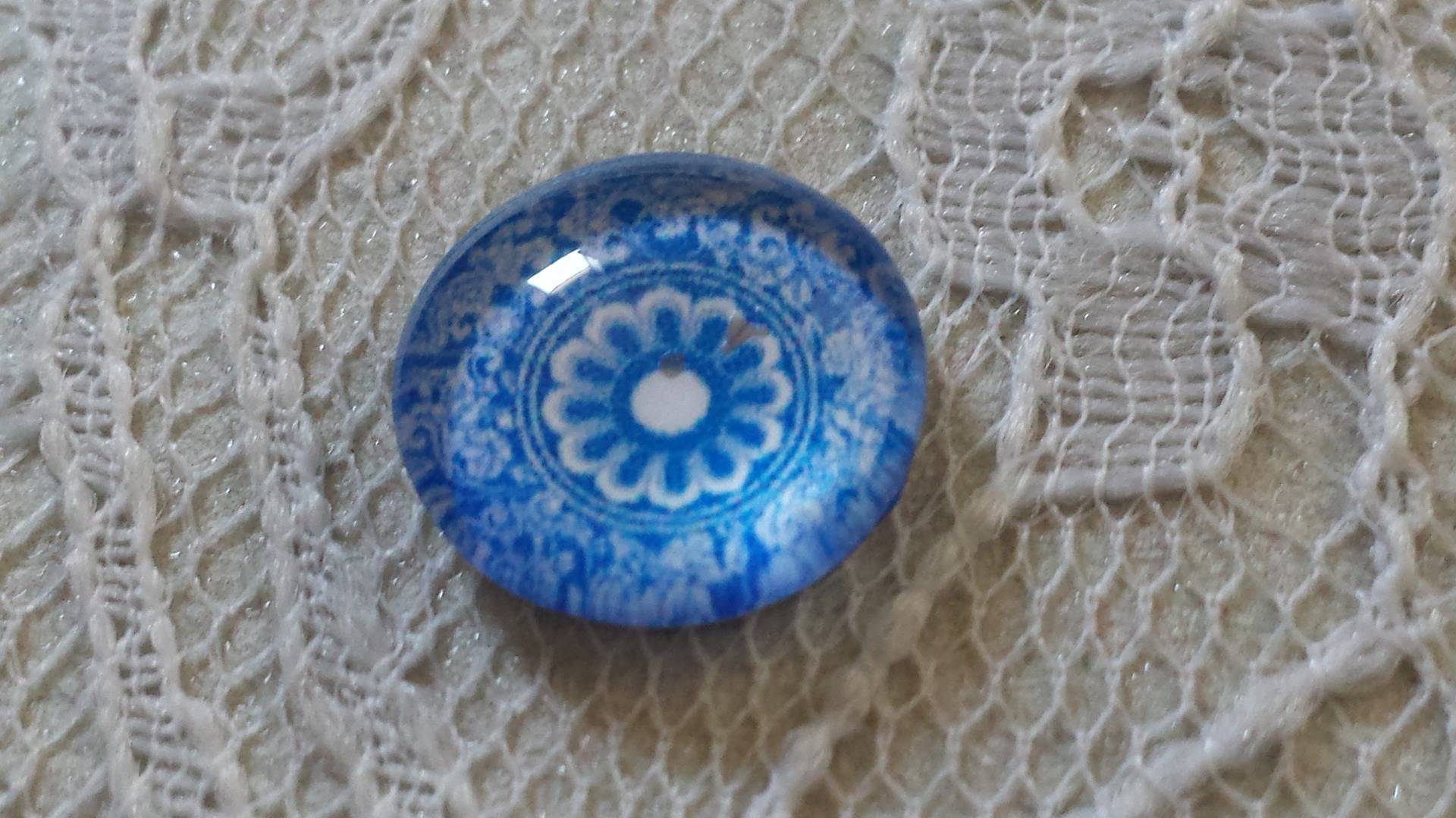 cabochon in vetro rotondo 12 mm fiore blu 026 