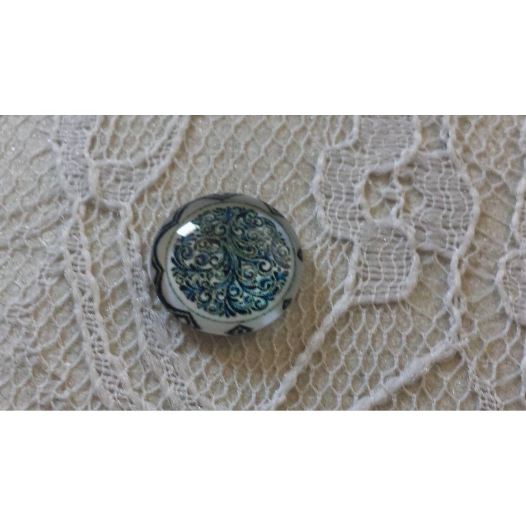 cabochon in vetro rotondo 12 mm fiore blu 025 