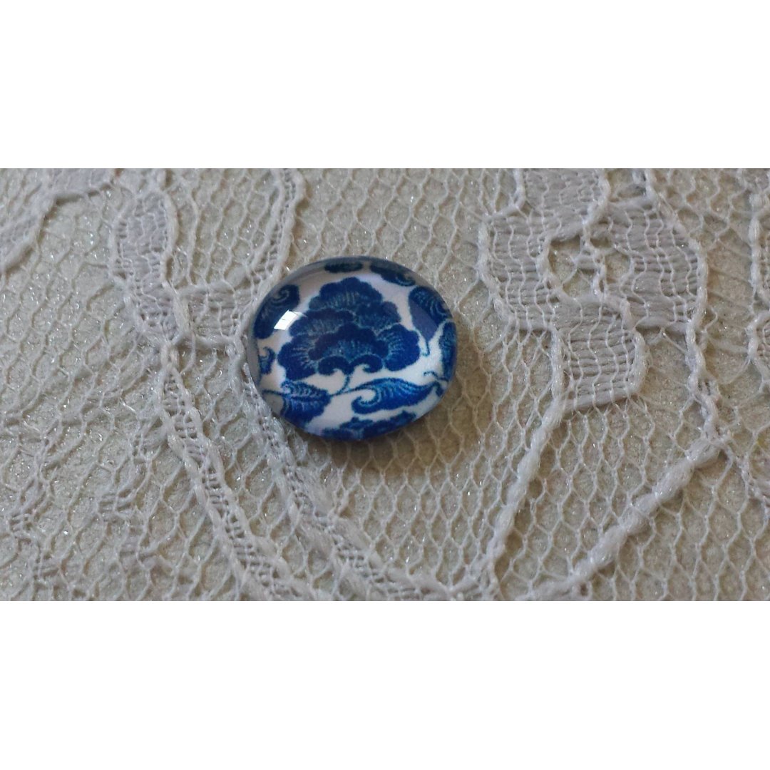 cabochon in vetro rotondo 12 mm fiore blu 017 