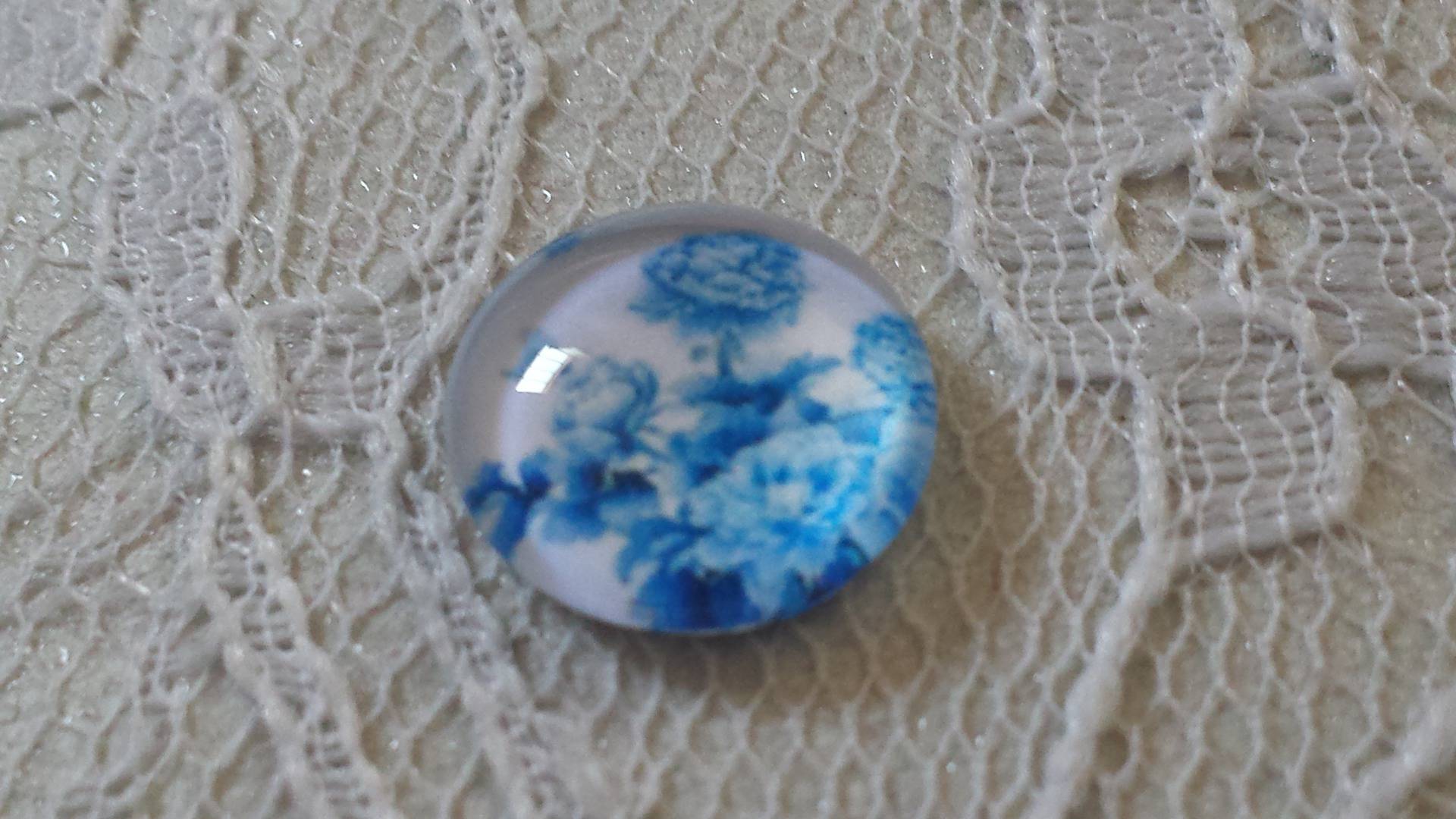 cabochon in vetro rotondo 12 mm fiore blu 016 