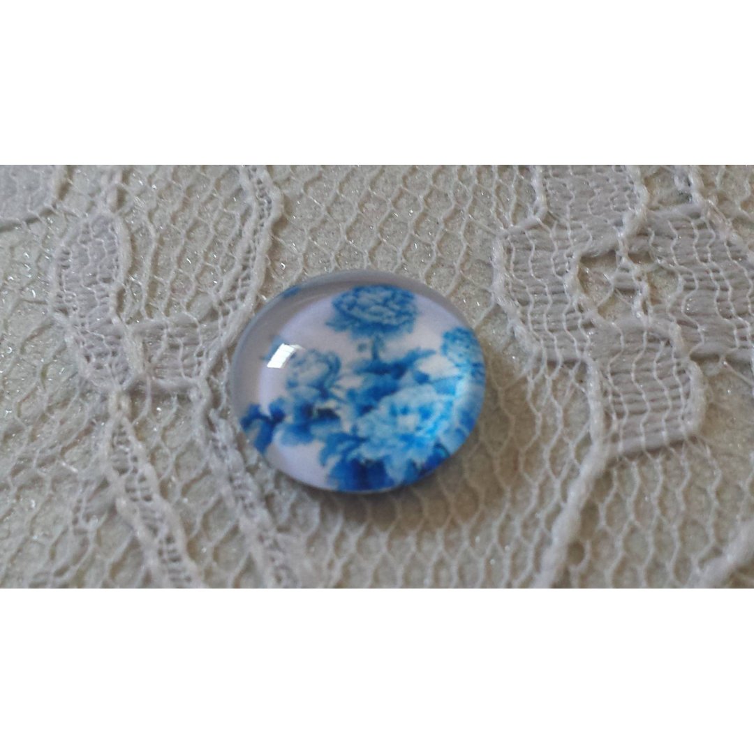 cabochon in vetro rotondo 12 mm fiore blu 016 