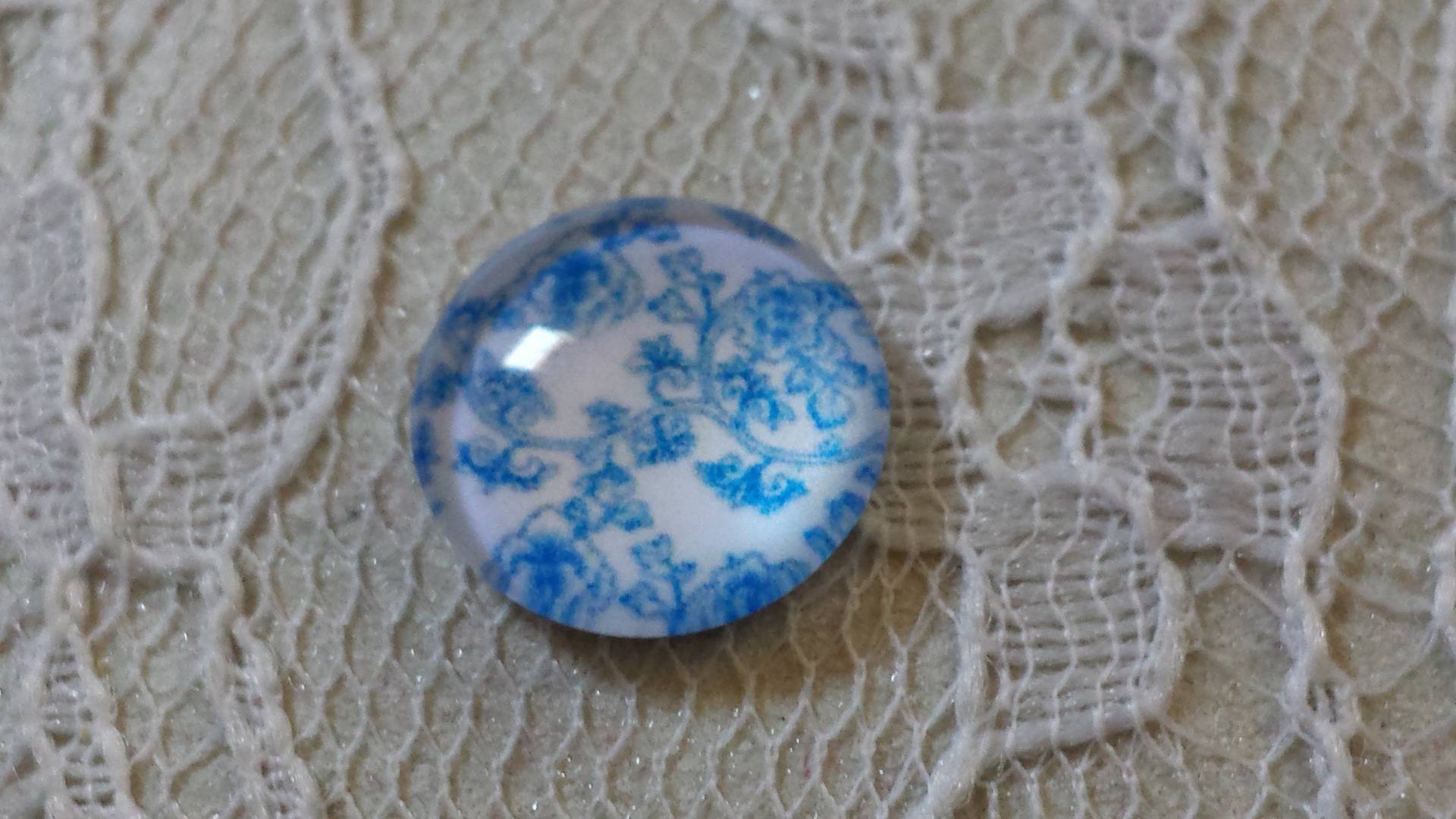 cabochon in vetro rotondo 12 mm fiore blu 006 