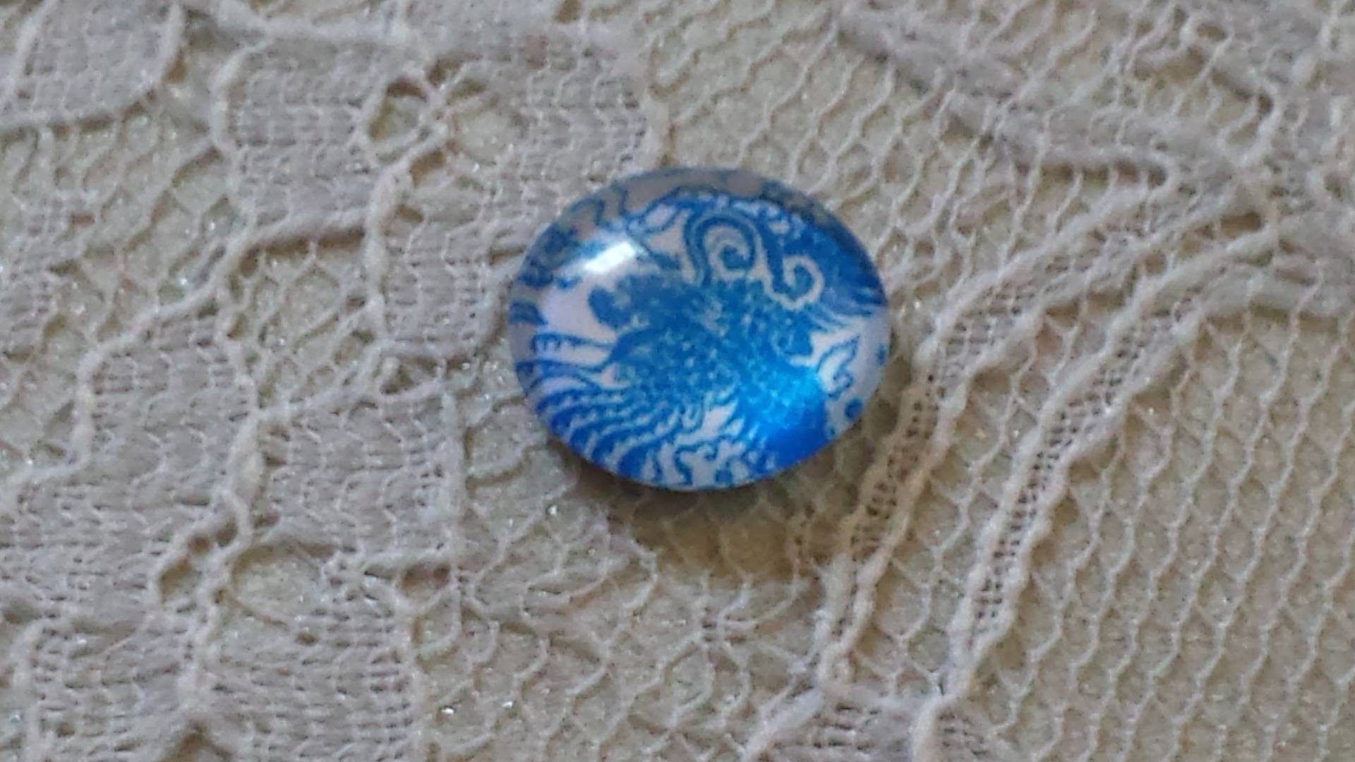 cabochon in vetro rotondo 12 mm fiore blu 002 