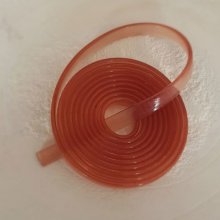 1 metro di cordoncino piatto in Pvc 5,8 x 1,9 mm Rosa antico traslucido