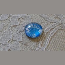 cabochon in vetro rotondo 12 mm fiore blu 002 