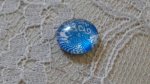 cabochon in vetro rotondo 12 mm fiore blu 002 
