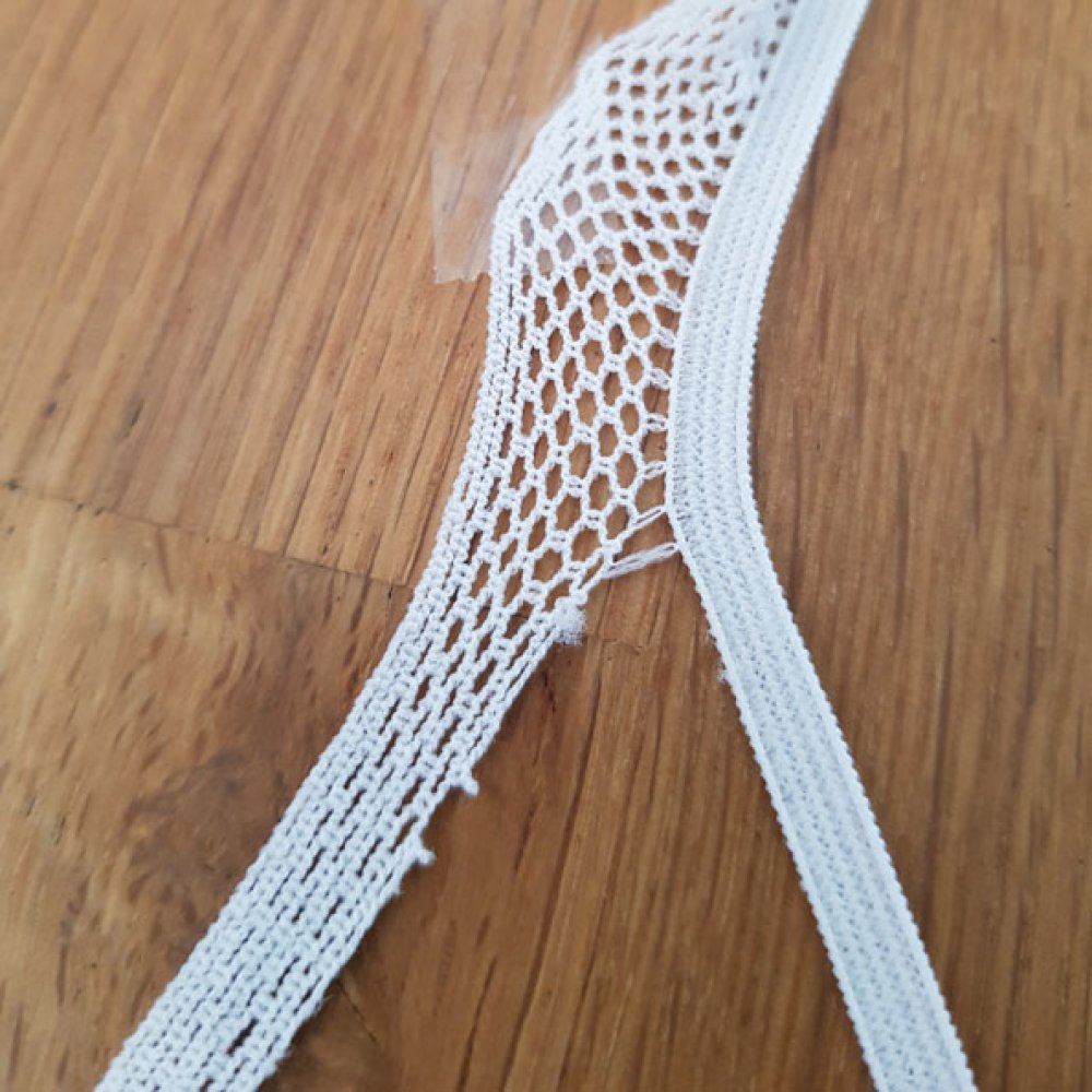 Pizzo elastico bianco da 4,5 mm da cucire