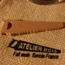 Miniatura di sega in legno massiccio di faggio, spessore 3 mm, decorata con un ceppo natalizio