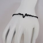 Bracciale nero sottile design Waves