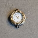 Cadran montre rond bronze et blanc petits passants fixes 