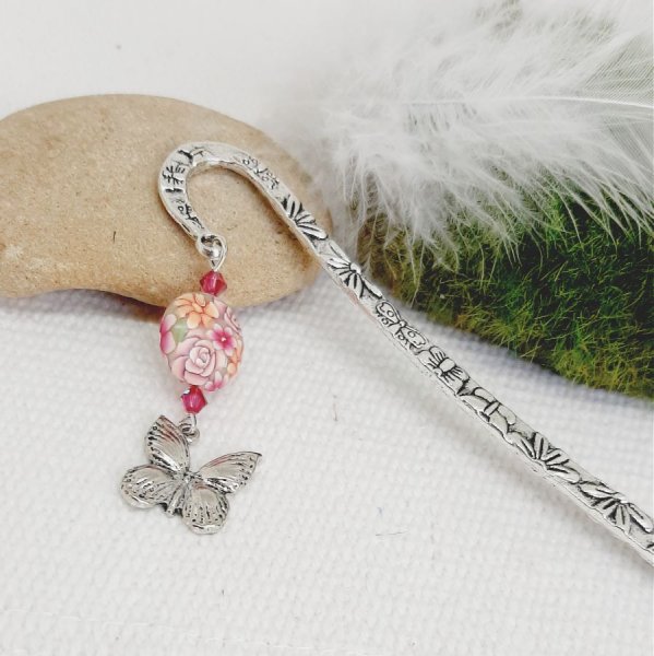 segnalibro in argento ciondolo farfalla e perla molto originale a forma di lente con design floreale