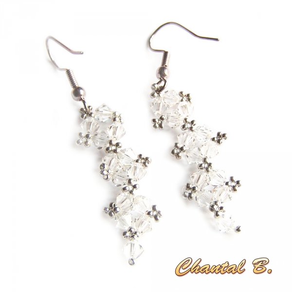 bracciale romantico swarovski rosa fucsia perline intrecciate swarovski cristallo rosa e argento