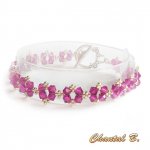 bracciale romantico swarovski rosa fucsia perline intrecciate swarovski cristallo rosa e argento