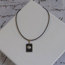 Collana con ciondolo in argento e metallo ardesia su silicone nero, creazione unica
