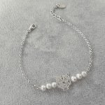 Bracciale di perle coltivate e tigri su catena d'argento 925