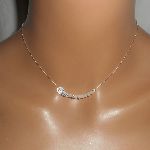 Collana girocollo in argento 925 con piccole perle di cristallo bianche e ad ala