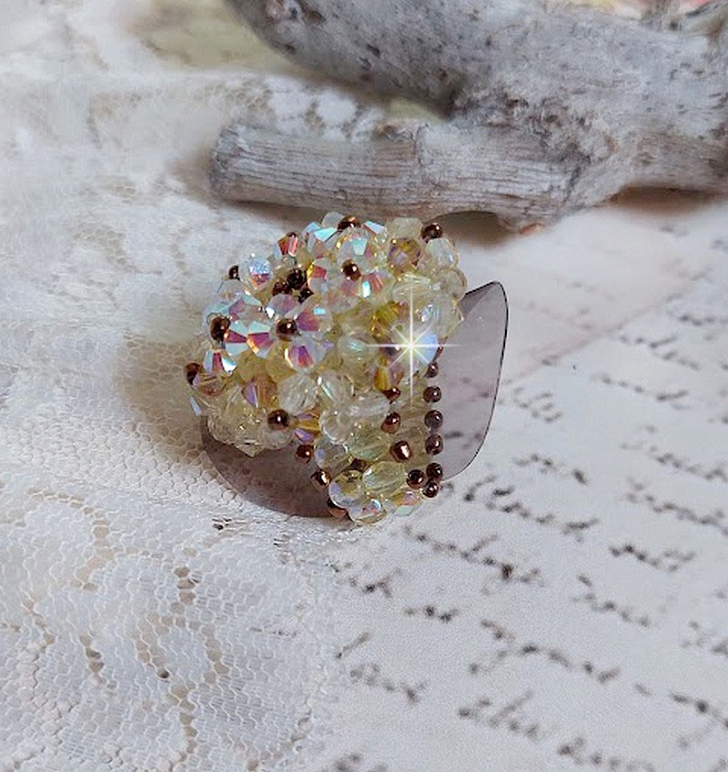 Anello Aurora con sfaccettature e cime rotanti in cristallo Swarovski