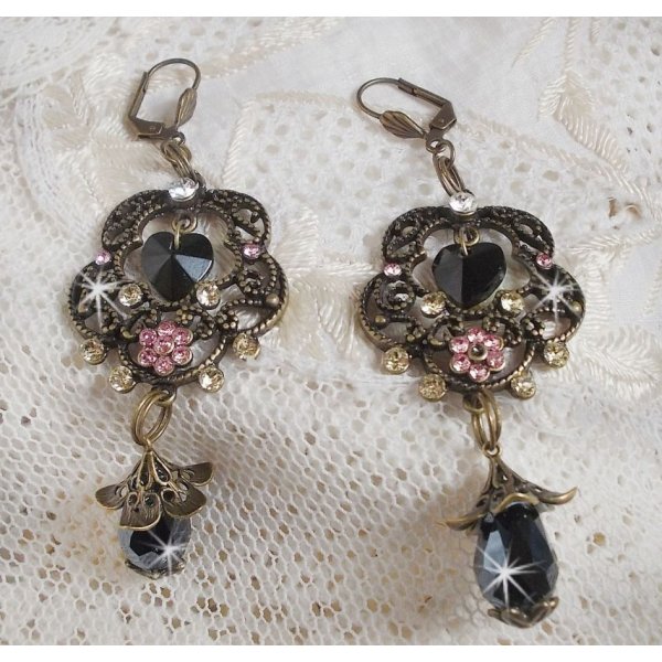 Collezione BO Irresistible Passion montata con cristalli Swarovski su portacandele a fiore in filigrana di bronzo