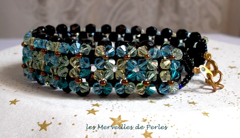 Scintillante bracciale Aurora con sfaccettature nere e trottole colorate in cristallo Swarovski