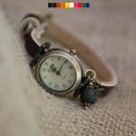 Orologio con charm in pietra lavica e cinturino in pelle a scelta