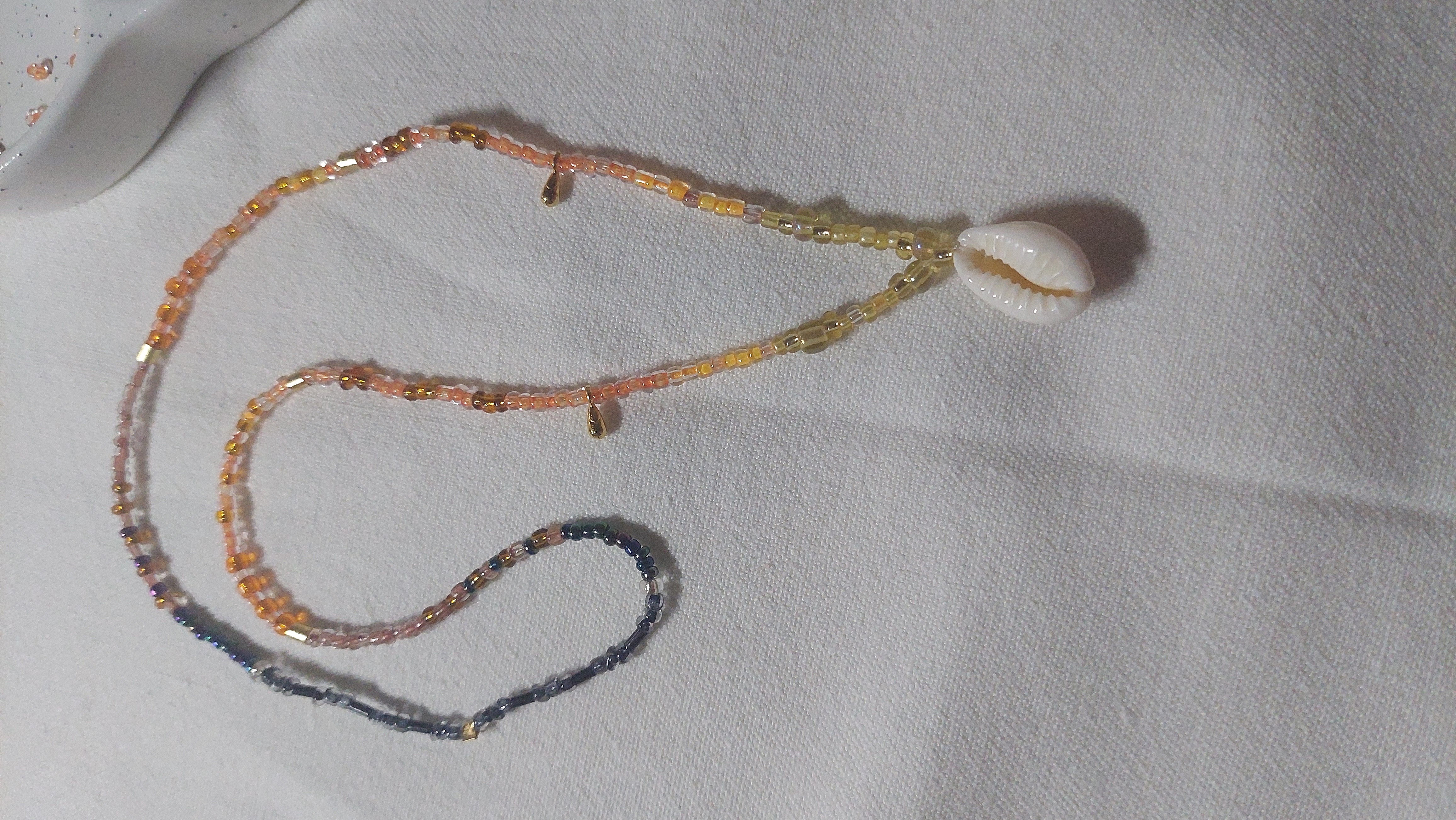 Collier coucher de soleil sur l'oc&eacute;an