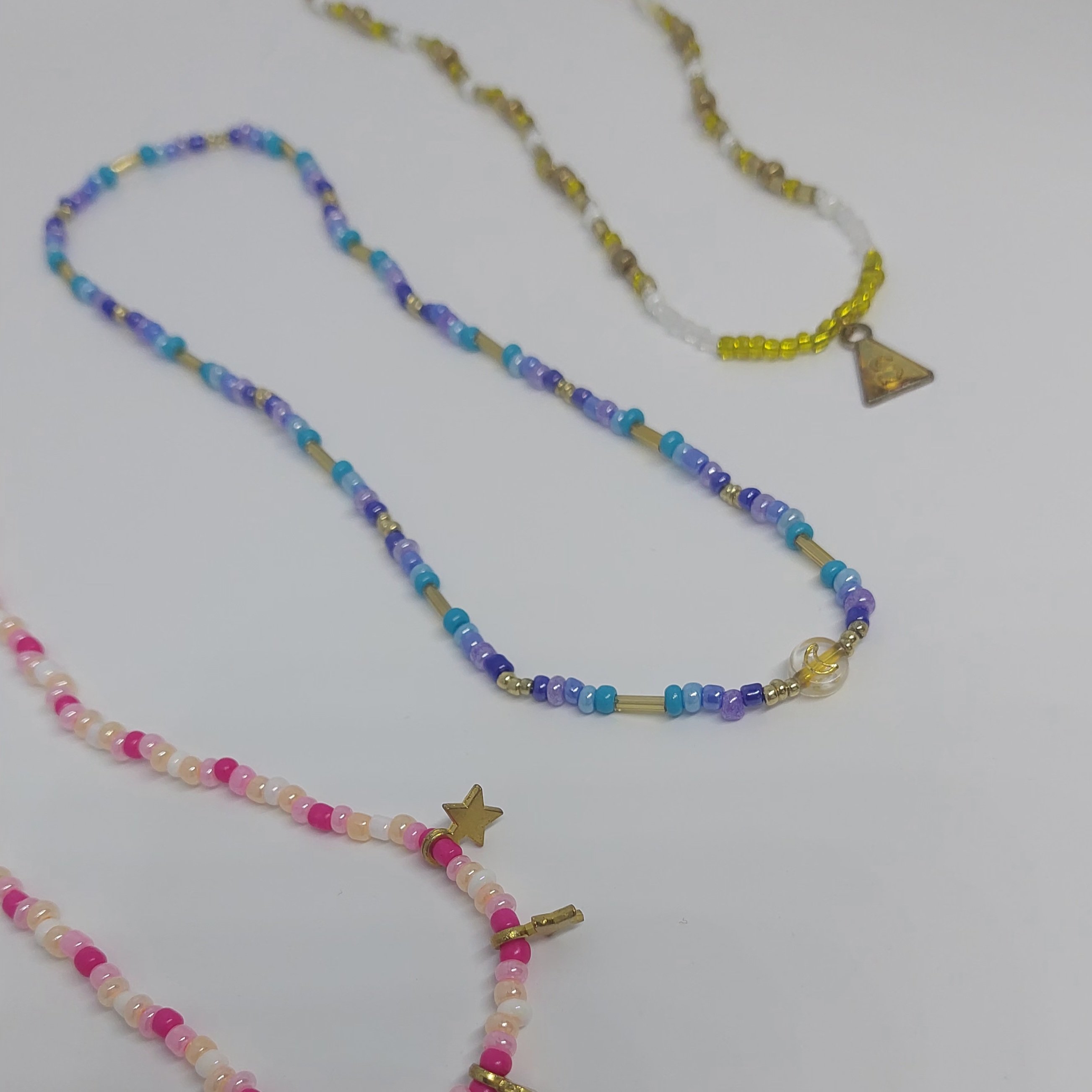 Ras du cou flaschi rose et &eacute;toiles dor&eacute;es