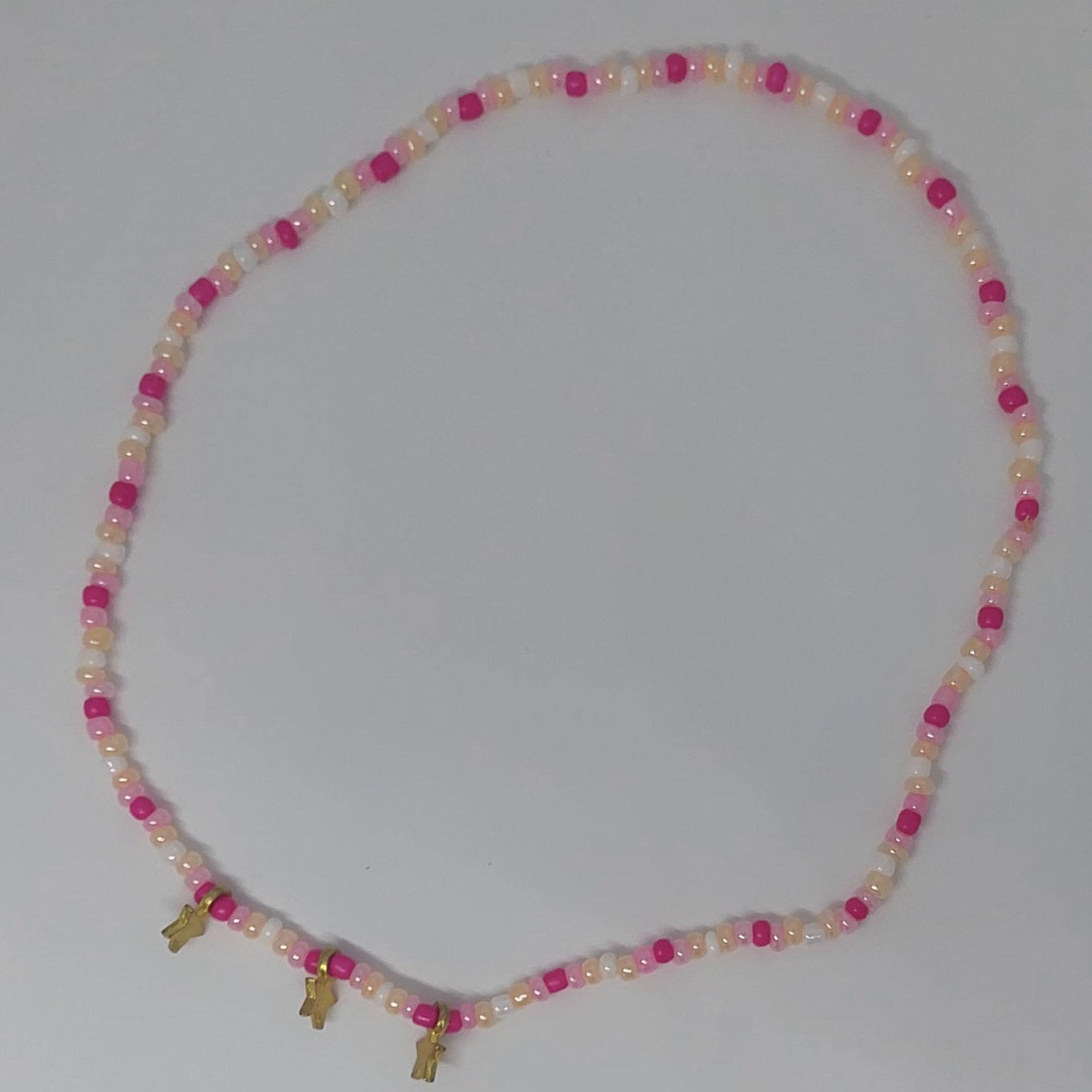 Ras du cou flaschi rose et &eacute;toiles dor&eacute;es