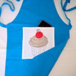 Grembiule ricamato per bambini cup cake